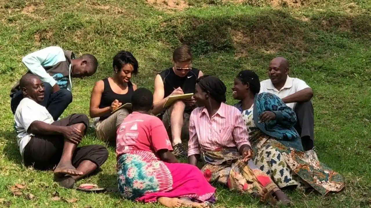 Close up on a plate of mashed potatoes, topped with baked pork chops with cream of mushroom soup, and a side of green beans.